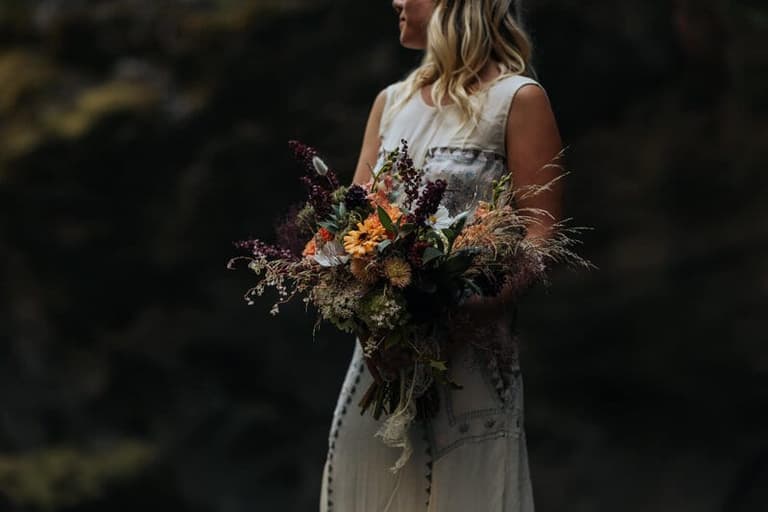 Bride holding flowers at her north Vancouver island wedding