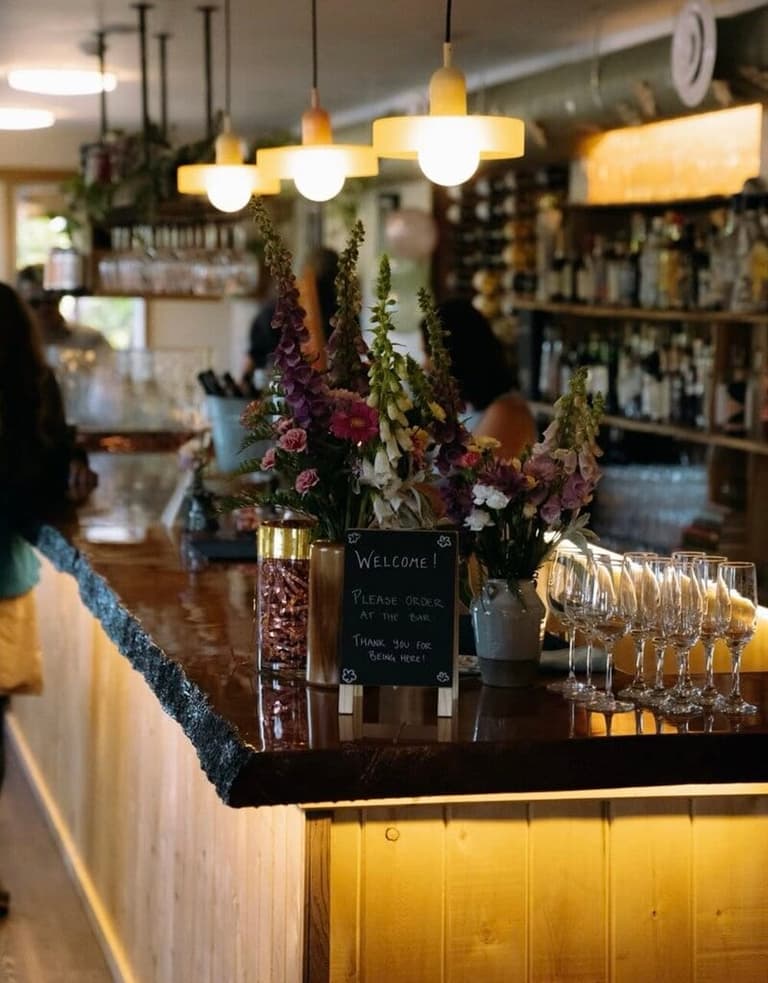 Foxglove-topped bar and wine glasses at floras in Bamfield