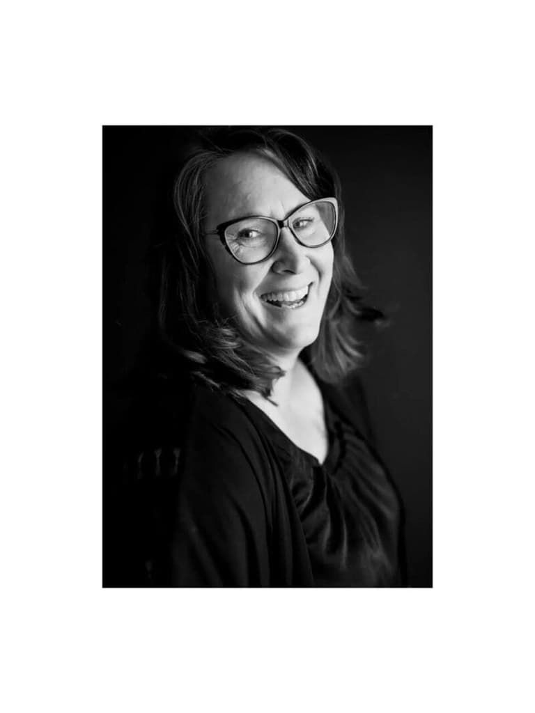 Black and white portrait of marriage commissioner Deanna Balcarras