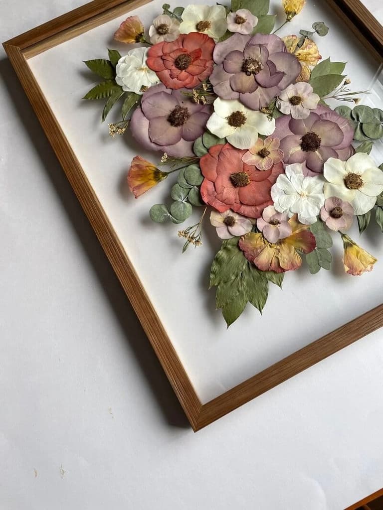 Framed pressed wedding bouquet preserved by Preserved Petals