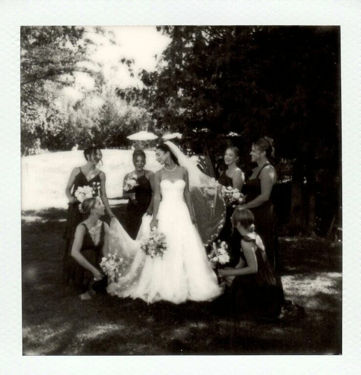 bridesmaids around bride on her wedding day